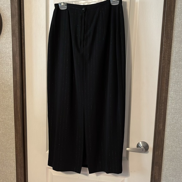 Straight black, pinstripe skirt, back zipper and back slit. - Picture 3 of 3